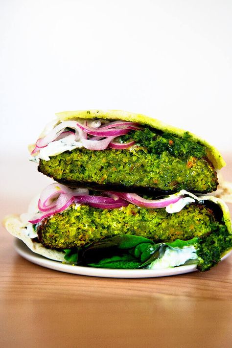 Falafel Burgers (Vegetarian, Broiled) | Alexandra's Kitchen Burgers Vegetarian, Falafel Burger, Falafel Burgers, Vegan Egg Replacement, Mushroom Quinoa, Peasant Bread, Tzatziki Recipes, Quick Pickled Onions, Dry Chickpeas