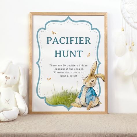 Pacifier hunt baby shower game poster featuring a cute illustration of Peter Rabbit. Boy baby shower idea. afflink Peter Rabbit Baby Shower Ideas Boys, Peter Rabbit Baby Shower Ideas, Neutral Posters, March Baby Shower, Peter The Rabbit, Pacifier Hunt, Boy Pacifier, Sprinkle Ideas, Garden Baby Shower Theme