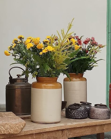 Serendipity Delhi on Instagram: “Around the store...changing up the interior styling set-up with old vintage Barni (pickle) jars as vases, stone artifacts and more for some…” Old Pickle Jars Diy Ideas, Pickle Jar Crafts, Jar Decorating Ideas, Global Decor, Pickle Jar, Jar Decor, Pickle Jars, Jar Diy, Jar Vase