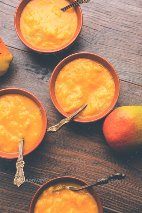 Aamras by stockimagefactory. Mango Pulp or Aam ras or Aamras served in small bowls, selective focus #Sponsored #Pulp, #Aam, #Mango, #Aamras Aam Ras, Mango Pulp, Small Bowls, Mango, Bowl, Fruit