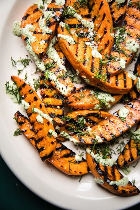 Lightly dressed with olive oil and salt, this easy grilled sweet potato recipe is the super-easy side dish you didn’t know you needed. Making Potato Salad, Grilled Sweet Corn, Grilled Sweet Potatoes, Autumn Side Dishes, The Modern Proper, Modern Proper, Grilled Halloumi, Healthy Yogurt, Sweet Potato Wedges