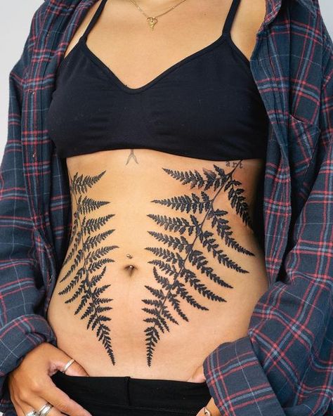 Sternum Belly Tattoo, Sternum Fern Tattoo, Tattoo Ideas For Nature Lovers, Nature Back Tattoo Women, Fern Shoulder Tattoos For Women, Fern Tattoo Back, Hip Fern Tattoo, Fern Sternum Tattoo, Fern Tattoo Hip