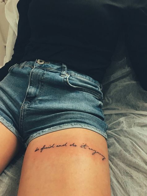 Thigh Word Tattoos For Women, Cursive Leg Tattoo, Small Matching Country Tattoos, Writing Tattoo On Thigh, Thigh Writting Tattoo, Quote Tattoos For Women Thigh, You Are Exactly Where You Need To Be Tattoo, Tattoo Thigh Quote, Script Thigh Tattoo Women