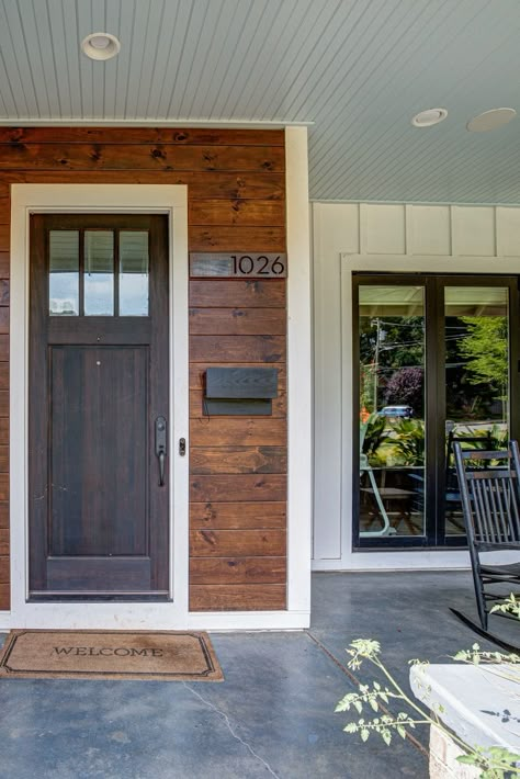 Wood Siding Around Front Door, Front Porch With Cedar Shakes, Outdoor Front Porch Ideas Modern, Exterior Accent Wall Front Porches, Wood Siding Front Porch, Front Door With Cedar Siding, Wood Accent Wall Front Porch, Outdoor Wood Accents On House, Wood Accent Front Porch