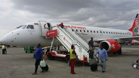 Embraer 190 Kenya Airways at Jomo Kenyatta International Airport, Nairobi,  Kenya. Nairobi Airport Kenya, Kenya Airways Planes, Jomo Kenyatta International Airport, Kenya Airways, Jomo Kenyatta, Airplane Illustration, In Airport, Travel Girl, Anniversary Flowers