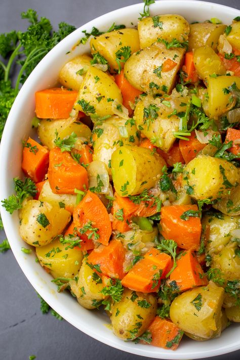 Buttery, herby, garlicky, oniony potatoes and carrots. The instant pot does a great job with this easy comfort food side dish. Not fancy. Just delish. Instant Pot Potatoes And Carrots Only, Cabbage Carrots And Potatoes Instant Pot, Potato And Carrot Recipes Slow Cooker, Boiled Carrots And Potatoes, Instant Pot Potatoes And Carrots, Potatoes And Carrots In Instant Pot, Carrot And Potato Recipes, Instant Pot Sides, Instant Pot Potato Recipes