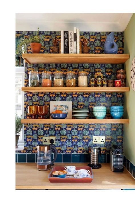 Open shelving can be tough to pull off in the kitchen. Check out these 50+ inspiring ideas to organize the pretties open shelves in the kitchen done by interior designers and home decor lovers. Kitchen Open Shelves Organization, No Shelf Kitchen, Open Hanging Shelves Kitchen, Hanging Kitchen Shelf, Exposed Shelf Kitchen, Wallpaper Behind Shelves Kitchen, Open Shelve Cabinet Kitchen, Colorful Open Shelving Kitchen, Kitchen Cabinets Shelves