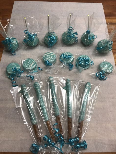 Teal Cake pops, choc covered pretzels , and chocolate Oreos Teal Cake Pops, Choc Covered Pretzels, Pretzels And Chocolate, Graduation Cake Pops, Wedding Charcuterie, Teal Cake, Eras Party, 18th Birthday Party Ideas, Marshmallow Dip