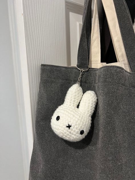 This adorable Miffy crochet keychain is handmade with love and care. It's the perfect gift for any Miffy fan or for someone who just wants a cute and cuddly addition to their.#crochetkeychain #handmadegifts #DIYkeychain #crochetlove #keychainaddict Small Simple Crochet Ideas, Miffy Keychain Crochet, Miffy Crochet Keychain, Crochet Keychain Aesthetic, Cute Crochet Accessories, Little Crochet Gifts, Crochet Gift Ideas For Friends, Keychain Crochet Ideas, Crochet Gifts For Friends