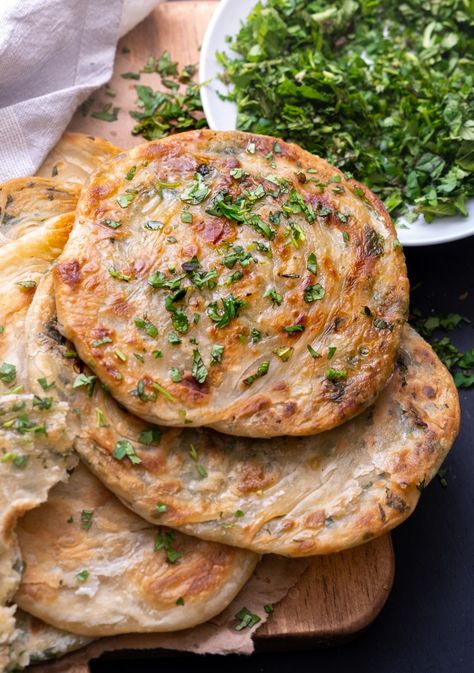 Herbed Olive Oil Parathas (Flaky Indian Flatbread) Infused Olive Oil Recipes, Wandering Chickpea, Paratha Bread, Olive Oil Pizza, Herb Infused Olive Oil, Indian Flatbread, Indian Flat Bread, Olive Oil Recipes, Herb Bread