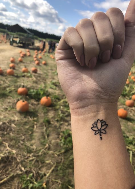 Semi-colon Tattoo Simple, Lotus And Semicolon Tattoo, Sun And Moon Semi Colon, Subtle Semi-colon Tattoo Ideas, Flower Semi Colon, Lotus Tattoo Wrist, Colon Tattoos, Tattoo Semicolon, Tiny Lotus Tattoo