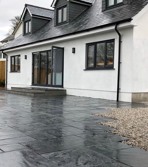 Blue Black Slate Paving 800x200 is a hard-wearing and durable natural stone paving designed for outdoor use and will stand the test of time, even in harsh weather! Black slate slabs are suited to the British climate offer a robust paving option which will last for decades! The dark tones will create an eye-catching finish to any exterior space and also look great when wet with the bold tones across the riven surface texture becoming more accentuated.https://nustone.co.uk/product/blue-black-slate Bog Witch, Natural Stone Paving, Slate Paving, Patio Kits, Witch Hut, Slate Patio, Stone Paving, Grey Patio, Patio Steps