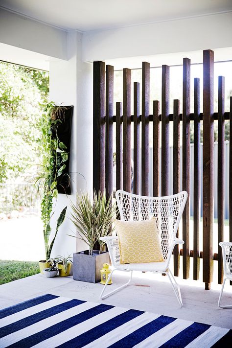 timber wall (to replace lattice) ikea chair. spotlight rug Timber Slat Wall Outdoor, Outdoor Lattice Ideas, Curb Appeal For Renters, Carport Screening Ideas, Screening Ideas, Alfresco Screening Ideas, Open Fence Ideas, Front Patio Privacy Ideas, Garden Screens Ideas