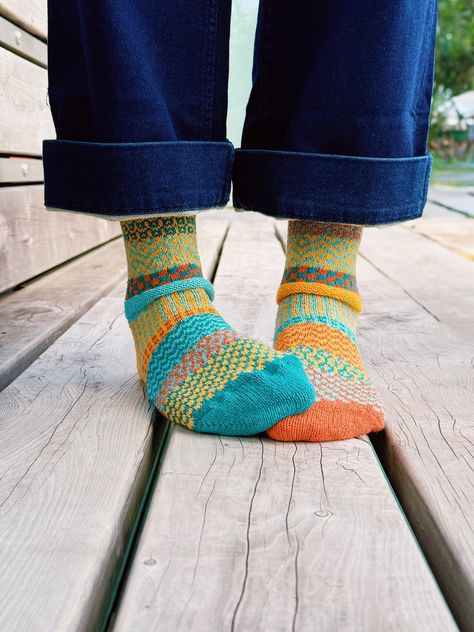 🌊✨ Introducing our newest creation – Dune Socks! Inspired by teal tides and sunlit sand, these beauties are your perfect adventure companions. With shades of sky blue, gold, and burnt orange, they bring coastal vibes right to your feet. 🏖️ Grab your pair today and step into the season with style! Solmate Socks, Shades Of Sky, Mismatched Socks, Slouch Socks, Coastal Vibes, Cup Cozy, Fingerless Mittens, Crew Sock, Colorful Socks