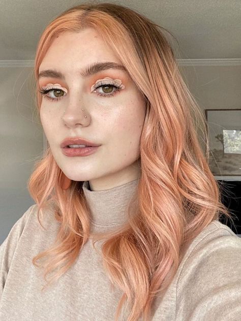 ARCTIC FOX HAIR COLOR @ohalexismarie doing a look like this and getting a decent picture of it is challenging with hooded eyes but i think i did alright! + bleached my bangs and refreshed my peach finally 🍑 #afporange #affrosé #orangehair #pinkhair #peachhair #coralhair #orangeaesthetic #pinkaesthetic #peachaesthetic #coralaesthetic #aesthetic #hairgoals #haircolor #hairdye #dyedhair #hair #quarantinehair #quarantinelooks #quarantine #stayhome #arcticfoxhaircolor Dimensional Peach Hair, Peachy Blonde Highlights, Coral Hair Dark Roots, Peach Color Block Hair, Light Peach Hair Color, Peach And Orange Hair, Pastel Color Block Hair, Peach Bob Hair, Peach Hair Dark Roots