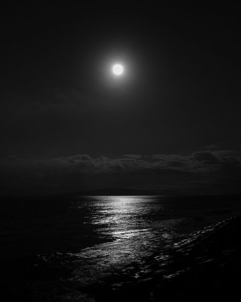 "Print Title - Moon Glow Introducing \"Moon Glow,\" a black and white photographic artwork capturing the captivating beauty of a full moon night in Maui, Hawaii. Taken from the rocky shoreline of Kalama Park, Maui, this artwork immortalizes the moon's ethereal glow reflecting over the ocean, guiding the viewer's gaze towards the distant island of Lanai. Presented in classic black and white, the image emits a modern romantic sensibility, transforming any space into a serene oasis. Ideal for sparking conversations, \"Moon Glow\" will surely become a cherished addition to your decor. Key Details ◦ Modern black and white full moon artwork photograph ◦ Premium archival lustre paper ensures lasting quality ◦ Sizes: 8x10, 11x14, 16x20, 20x24, 24x30, 40x50 ◦ Comes unmatted, ready for your personal Black And White Images Aesthetic, Black Pictures Aesthetic, Asthetic Picture Dark, Black Ethereal Aesthetic, Black Asthetics Photos, Black Aesthetic Images, Soft Black Aesthetic, Black Aesthetic Pictures, Black Christmas Aesthetic