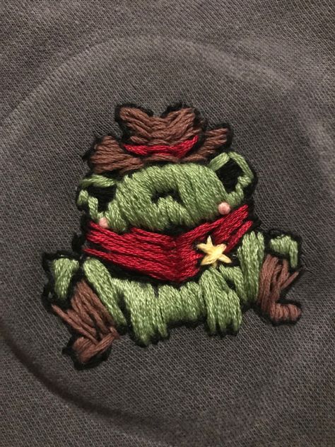 Silly Embroidery, Masculine Embroidery Designs, Frog Embroidery, Embroidery Frog Pattern, Frogs In Sweaters, Frog Hand Embroidery, Embroidered Frog, Crochet Frog In Sweater, Cowboy Hat Embroidery