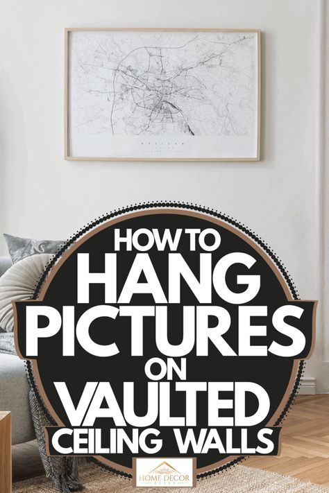 How To Hang Pictures On Vaulted Ceiling Walls - Home Decor Bliss Vaulted Ceilings Wall Decor, Vaulted Ceiling Art Wall, Decorating Wall With Vaulted Ceilings, How To Decorate A Vaulted Wall Living Rooms, Vaulted Living Room Wall Decor, Decorating Great Room With High Ceilings, Hanging Pictures On Slanted Walls, Decor Vaulted Ceiling Walls, Picture Rail Vaulted Ceiling