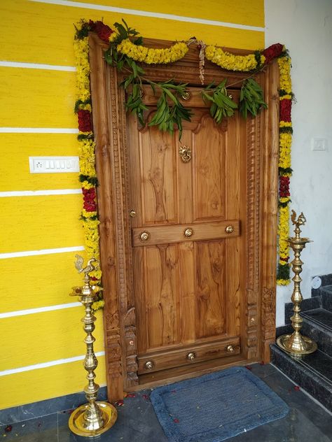 Teak wood chettinad style main door Chettinad House Entrance, Chettinad House Main Door, Main Door Designs Teak Wood, Teak Main Door Design Entrance, Teak Wood Main Door Design Entrance Indian, Balcony Door Design, Teak Wood Main Door Design, Front Door Options, Teak Door