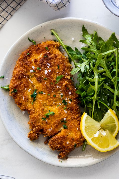 Crispy chicken schnitzel is easy to make and delicious. Panko-crusted and fried until golden, it is the perfect family dinner recipe. #dinnerideas #easychickenrecipe Mini Spanakopita, Lunch Ideas With Chicken, Avocado Bruschetta, Greek Pork, Pork Souvlaki, Cranberry Sangria, Lemon Risotto, Tuscan Salmon, Stuffed Butternut