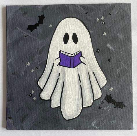 "6\"x6\" Hand Painted Halloween Ghost with with Book Canvas Painting This small ghost painting is the perfect addition to your fall/Halloween decor.  Hand painted on a 6\"x6\" canvas with acrylic paint, each painting is one of a kind. These paintings are made to order and may vary slightly.  A great gift for a friend or family member or perfect just for you! **This is a FLAT canvas. It is as thick as a piece of cardboard and does not have a wooden frame." Book Canvas Painting, Easy Ghost Painting, Ghost With Book, Canvas Halloween Painting Ideas, Ghost Halloween Decor, Halloween Canvas Paintings, Art Mini Toile, Halloween Canvas Art, Hand Painted Halloween