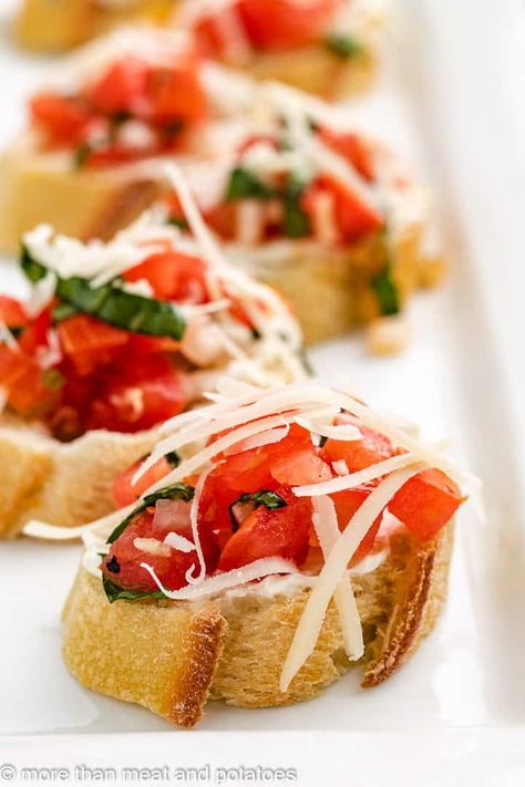 Cream Cheese Bruschetta is a spin on traditional tomato bruschetta. This version has a layer of creamy, basil cream cheese just beneath the tomato mixture that adds a wonderful taste and texture that takes this appetizer up a notch. #morethanmeatandpotatoes Bruschetta With Cream Cheese, Cheese Bruschetta, Italian Appetizer, Simple Appetizer, Recipes Shrimp, Tomato Bruschetta, Bruschetta Recipe, Recipes Soup, Italian Appetizers