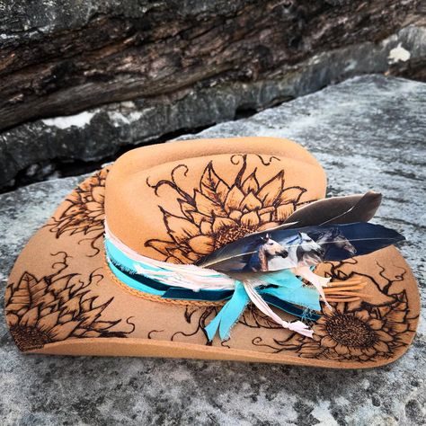 This hat got a serious upgrade! Checkout these feathers from @buckaroosupplycompany 🫶🏻 . . . #custom #hat #westernhat #horses #horselove #sunflower #customhat #feathers #westernvibes #country #westernfashion #westernwear #burnedhats #tattooed #pyrography #art #artist Burned Hats, Cowboy Hat Design, Pyrography Art, Feather Painting, Hat Ideas, Western Hats, Horse Love, Custom Hats, Pyrography