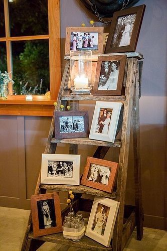 Love this use of a vintage ladder as a shelf for framed photos. Great vintage wedding decor ideas with ladders and old photos Rustic Country Wedding Decorations, Fun Wedding Decor, Old Ladder, Rustic Ladder, Country Wedding Decorations, בר מצווה, Vintage Wedding Decorations, Country Living Room, 50th Wedding Anniversary