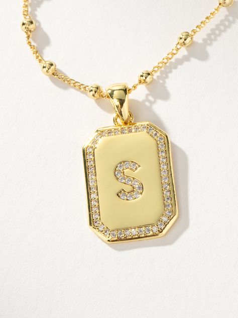 Sur 2.0 Necklace | Gold S | Product Detail Image | Uncommon James Gold Letter Pendants, Uncommon James, Letter Pendant Necklace, Gold Letter, 7 Rings, Initial Jewelry, Letter Pendants, Gold Letters, Necklace Personalized