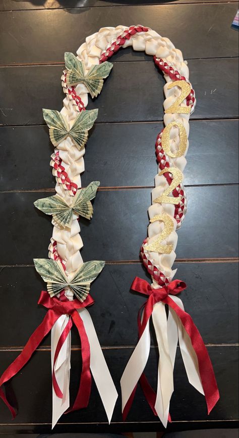 Graduation butterfly money lei 2022 | Hawaiian ribbon lei Graduation Money Lei Butterfly, Ribbon Lei For Graduation, 8th Grade Lei Ideas, Making A Graduation Lei, Fun Leis For Graduation, Grad Leis Diy Ribbon, Ribbon And Money Lei, Graduation Rope Ideas, Grad Ribbon Lei