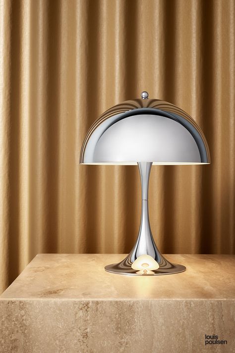 PH 5 • A new chrome edition of Verner Panton’s head-turning sculptural lamp enters the scene, reflecting its surroundings and enlivening even the smallest nooks with its gleaming, elegant new profile. • #louispoulsen #danishdesign #scandinaviandesign #light #lighting #interior #interiordesignproject #licht #beleuchtung #interieur Verner Panton Lamp, Panthella Lamp, Panthella Mini, Louis Poulsen Lighting, Mini Table Lamps, Table Led, Mini Lamp, Mid Century Lighting, Verner Panton