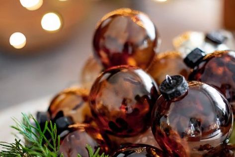 Amber Glass Ornaments DIY Amber Glass Christmas Decor, Amber Ornaments Diy, Diy Amber Glass Ornaments, Amber Glass Ornaments, Amber Ornament, Amber Glass Christmas, Cheap Christmas Ornaments, Glass Ornaments Diy, Color Ornaments