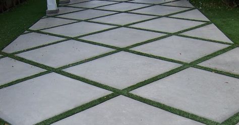 Here is an interesting way to spruce up concrete,   with Field Turf in the expansion joints.   Photo by Doug Kalal Poured Concrete Patio, Beautiful Driveways, Concrete Pathway, Large Pavers, Driveway Ideas, Garden Walkway, Front Patio, Concrete Pavers, Patio Plants