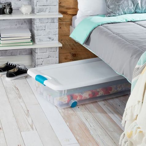 9 Things You Should Never Store Under the Bed | Apartment Therapy Appliances In Pantry, Three Tier Cart, Lilac Room Decor, Bedroom Hacks, Big Closets, Bedroom Organization, Plastic Storage Bins, Closet Rod, Bed In Closet