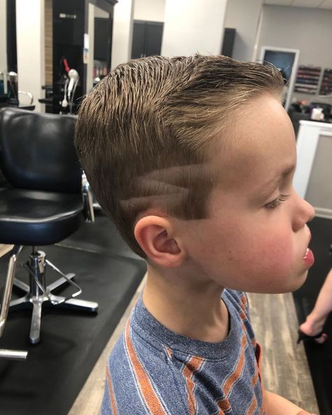 First buzz haircut with a thunder bolt design on the side by @hairbylynnr ✨ . . . . . . . . . . . #HillsboroughSalon #HillsboroughStylist… Boys Hair Cut With Lightening Bolts, Lighting Bolt Hair Design Boys, Boys Haircut Lightning Bolt, Lightening Bolt Hair Design Boys, Lightning Bolt Hair Design For Boys, Boys Haircut With Design On Side, Boys Haircuts With Designs, Hair Designs For Boys, Buzz Haircut