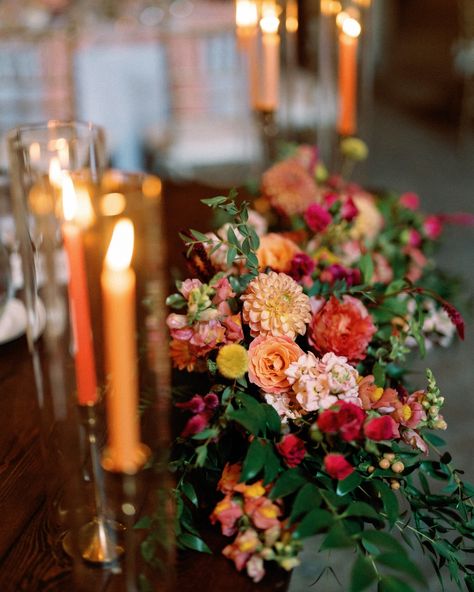 The colors at this late summer wedding were absolutely stunning! With deep orange, hot pink, soft light pink, and rich dark green, the floral arrangements created a beautiful, romantic, and warm atmosphere that perfectly captured the essence of the season.  

Featuring vibrant snapdragons and elegant dahlias, the florals brought a captivating energy to every corner of the celebration. The bold colors combined with the lush greenery added a sense of richness and romance. Wedding Colors Late Summer, Late Summer Floral Arrangements, Green Pink And Orange Wedding, Mums Wedding Flowers, Late Summer Wedding Colors, Vibrant Fall Wedding, Thanksgiving Floral Arrangements, Fuschia Wedding, Wedding Color Palette Summer