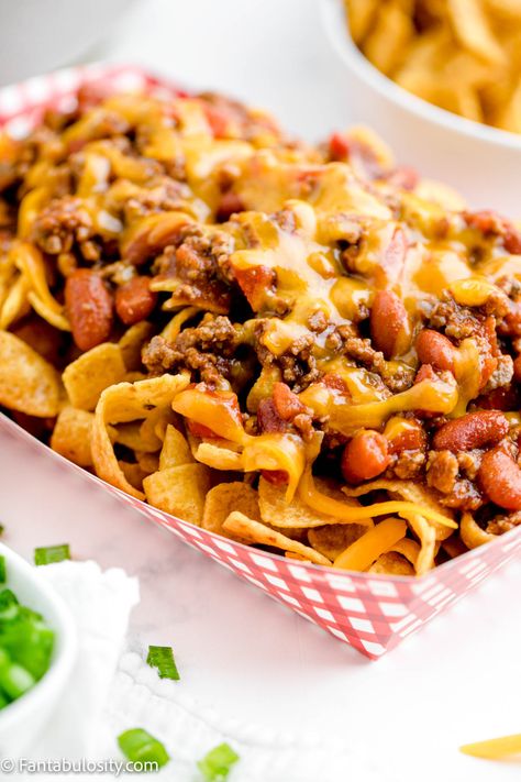 This Frito Chili Pie is so easy! #frito #chili #fritopie #fritochilipie #fritos #walkingtacos Frito Bag Chili, Upside Down Frito Pie, Chili Pie Frito, Fritos Scoops Recipes, The Best Frito Pie, Dinners With Chili, Chili Fritos Recipe, Fritos And Chili, Easy Frito Chili Pie