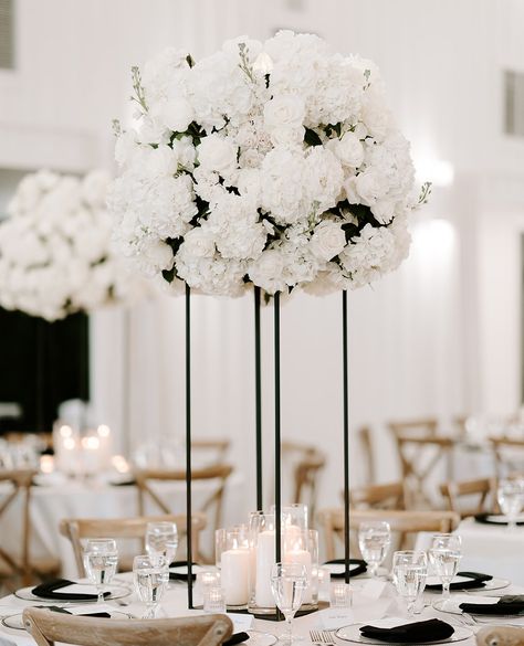 Black And White Tall Centerpieces, White Wedding Flowers Centerpieces Tall, Tall White Floral Centerpieces Wedding, Big Wedding Centerpieces, All White Centerpieces Wedding, Tall Wedding Centerpieces Elegant, White Centerpiece Wedding, Tall Centerpiece Wedding, Round Table Centerpieces Wedding