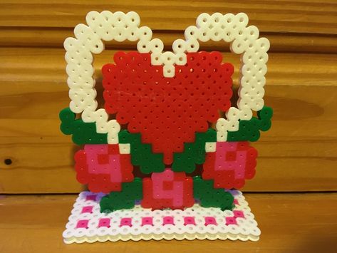 Perler Bead Heart with Roses Mother’s Day Valentine’s Day Mother’s Day Perler, Mothers Day Perler Bead Patterns, Mom Perler Beads, Mothers Day Perler Beads, Perler Beads Valentines Day, Valentine’s Day Perler Beads, Valentines Perler Beads, Perler Bead Heart, Beads Painting