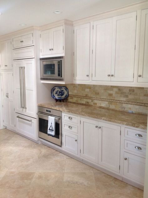 Beige Tile Kitchen, Dark Tile Floors, Kitchen Cabinets And Flooring, Off White Kitchen Cabinets, Travertine Flooring, Crystal Cabinets, Wolf Appliances, Marble Counters, Light Marble