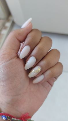 Gold Leaf Gel Nails, Gold Leaf Wedding Nails, White And Gold Acrylic Nails Almond, Acrylic Nail Designs Milky White, Almond Nails Designs Milky White, White Almond Nails With Accent Nail, Milky Acrylic Nails Almond, Nail Designs With Gold Leaf, Milky White Nails With Gold Glitter