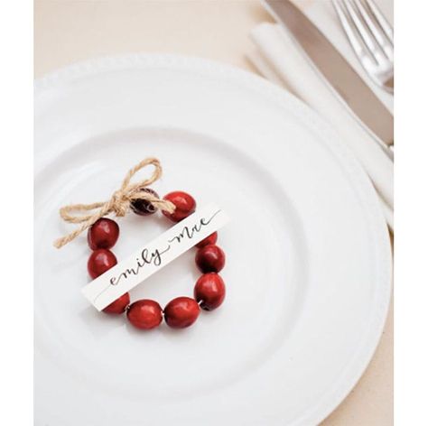 10 DIY Christmas Place Cards for Your Holiday Table - PureWow Christmas Placecards Ideas, Diy Christmas Name Place Cards, Holiday Name Place Cards, Diy Christmas Place Cards, Christmas Place Settings Diy Name Cards, Christmas Place Card Ideas, Christmas Name Place Ideas, Christmas Place Settings Diy, Christmas Place Cards Diy