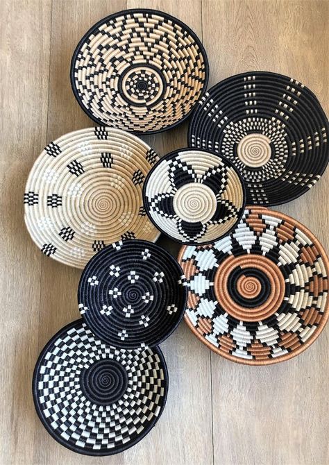 African Baskets On Wall, African Bedroom Ideas, African Baskets Wall, African Interior Design, African Wall Baskets, African Inspired Decor, Basket Wall Art, African Interior, African Basket