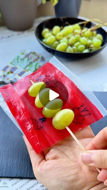 Tinka on Instagram: "Frozen Fruit Roll-Up Skewer Grapes 🍡🍇 Looking for a fun new way to enjoy frozen grapes? Try this creative twist with Fruit Roll-Ups! Drizzle with fresh lime juice for an extra zesty kick 🍋

Ingredients:
- Green grapes
- Fruit Roll-Ups
- Lime juice

Thread the grapes onto skewers and wrap them with Fruit Roll-Ups. Freeze until solid. Life hack: Use the plastic wrapper to easily wrap the grapes without them sticking 😌

Save this recipe for a new way of eating Fruit Roll-Up Grapes and follow for more snack ideas! 😍

#fruitrollups #fruitrollup #grapes #candygrapes #frozengrapes #frozen #sweetsour #sweetandsour #snack #snackidea #fruits #fruitlover #fruitasmr #summersnacks #asmr #asmrvideo #asmrsound #asmrcommunity #healthysnacks #healthyrecipes #easysnack #quicksnack" Fruit Roll Up Grapes, Fruit Sticks, Green Snacks, Frozen Grapes, Fruit Roll Ups, Snacks To Make, Eat Fruit, Green Grapes, Summer Snacks