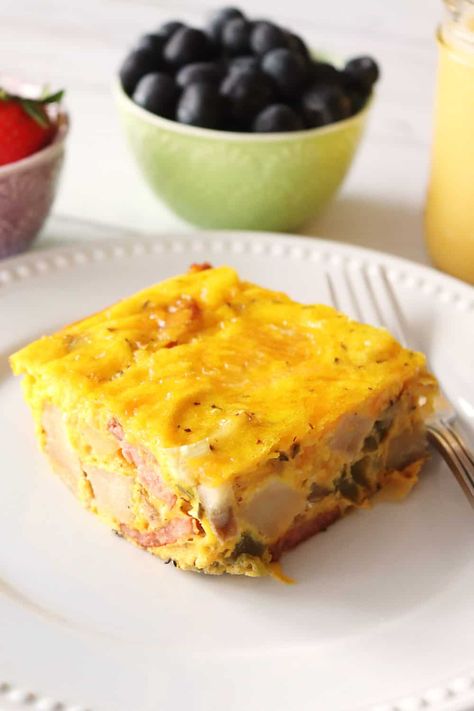 Easy breakfast casserole with sausage and potatoes, eggs, onions, green peppers, and melted cheddar cheese all baked together in a casserole dish. Air Fryer Stuffed Mushrooms, Breakfast Casserole With Sausage, Casserole With Sausage, Sausage And Potatoes, Easy Breakfast Casserole, Breakfast Casserole Easy, Breakfast Casserole Sausage, Green Peppers, Easy Air Fryer