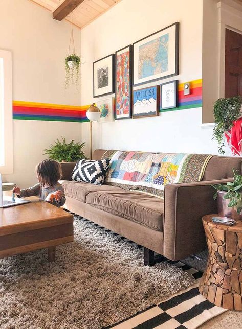 Racheal Jackson of Banyan Bridges painted a rainbow stripe mural in her living room. DIY, stripe, rainbow mural inspiration. Stripe Mural, Stripes Wall Paint, Painted Stripes On Wall, Rainbow Stripe Wall, Rainbow Mural, Stripe Wall, Striped Room, Striped Walls, Rainbow Room