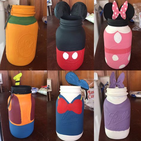 Got my Mickey Mouse Clubhouse character mason jars finished!! One more thing checked off the list before Saturday!! Mickey Mouse Mason Jar Ideas, Disney Party Centerpieces, Doodles Birthday, Mickey Mouse Centerpiece, Mickey Mouse Crafts, Mickey Mouse Birthday Decorations, Mickey Mouse Clubhouse Birthday Party, Mickey Mouse Clubhouse Party, Mickey Birthday Party