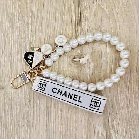 Authentic Chanel ribbon made DIY keychain Looking... - Depop Ribbon Keychains Diy, Chanel Keychain, Jewelry Vendor Display, Chanel Ribbon, Keychains Diy, Ribbon Keychain, Vendor Displays, Jewelry Vendor, How To Make Ribbon