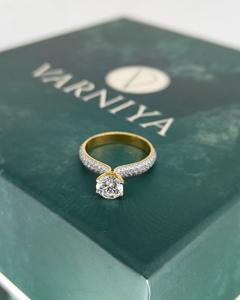 Introducing Aurora: The Epitome of Brilliance 💍✨ Prepare to be mesmerized by Varniya’s bestseller, the Aurora solitaire ring. Set in a pavé band, its unparalleled clarity and brightness will leave you breathless. Illuminate your love story with this radiant beauty 💎 . . . lab grown diamond jewellery solitaire engagement ring women’s ring gold 18k band made in India elegant Diamond Ring Design For Women, Engagement Indian, Solitaire Ring Designs, Fancy Jewellery Designs, Diamond Rings Design, Pave Band, Gold Ring Designs, Fancy Jewellery, Gold Band Ring