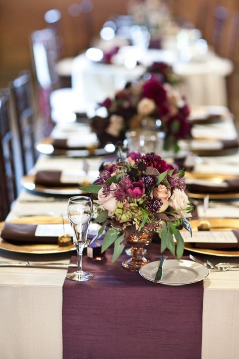 Gold Table Decor, Plum and Gold Settings, Plum and Gold Wedding Decor. Could also switch to silver instead of gold. Plum And Gold Wedding, Wedding Centerpeices, Wedding Interior, Gold Table Decor, Wedding Decorating, Plum Wedding, Gold Wedding Decorations, Table Runners Wedding, Magnolia Leaves